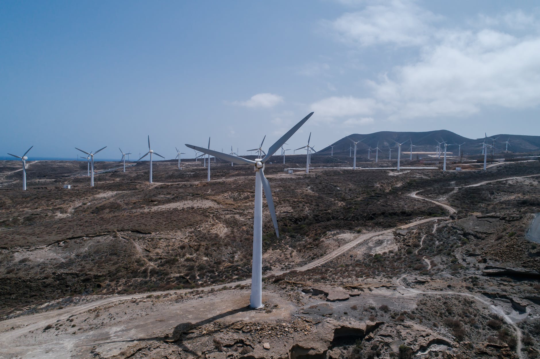 eco wind turbine on wasteland